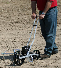 Earthway Precision Garden Seeder shown in a garden